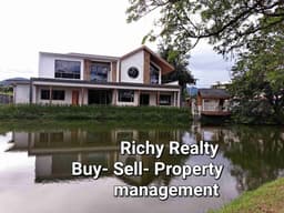 Richy Realty logo Richy Realty logo