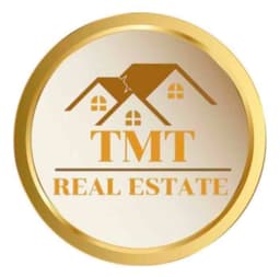 TMT REAL ESTATE logo